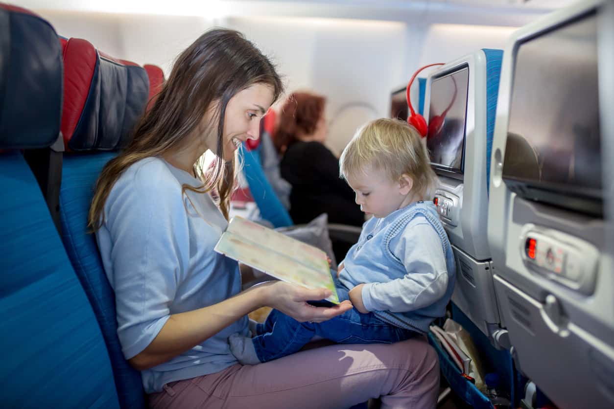 How to Actually Enjoy Flying With a Toddler on Your Lap