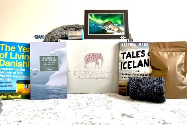 A quarterly luxury book club subscription box for travelers who want to give back.