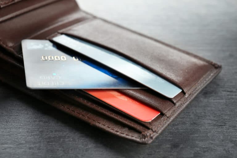 Wallet with credit cards as decorative to help illustrate Bank of America application rules