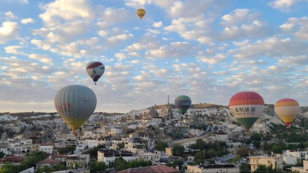 Hot air balloons soar above Goreme, Cappadocia