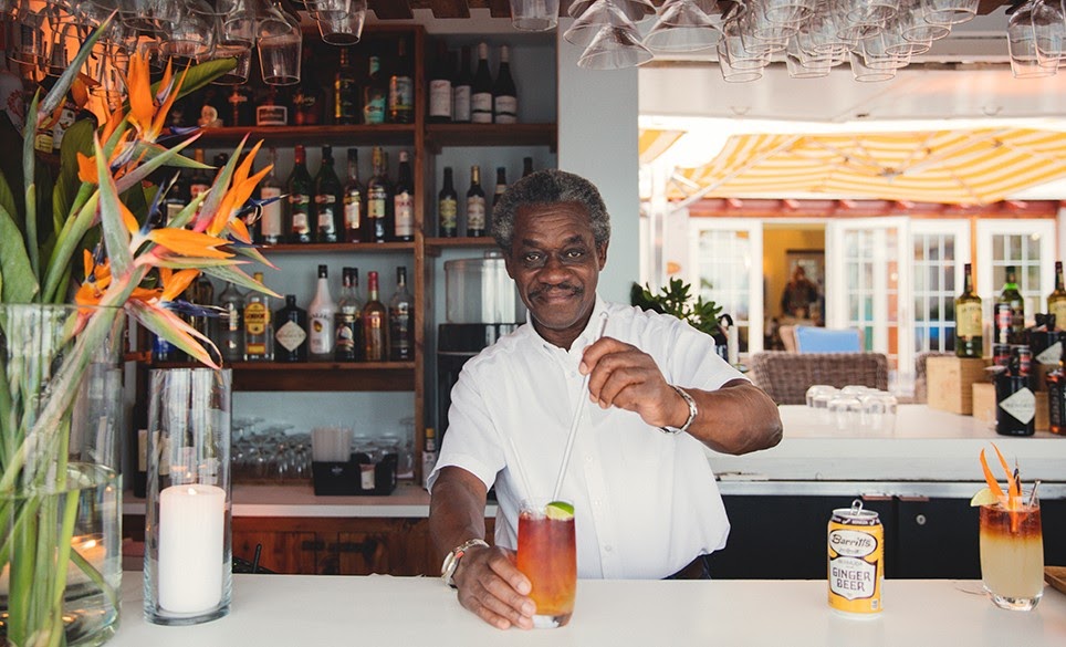 weekend getaways to Bermuda - dark n stormy bar bartendar local cocktail