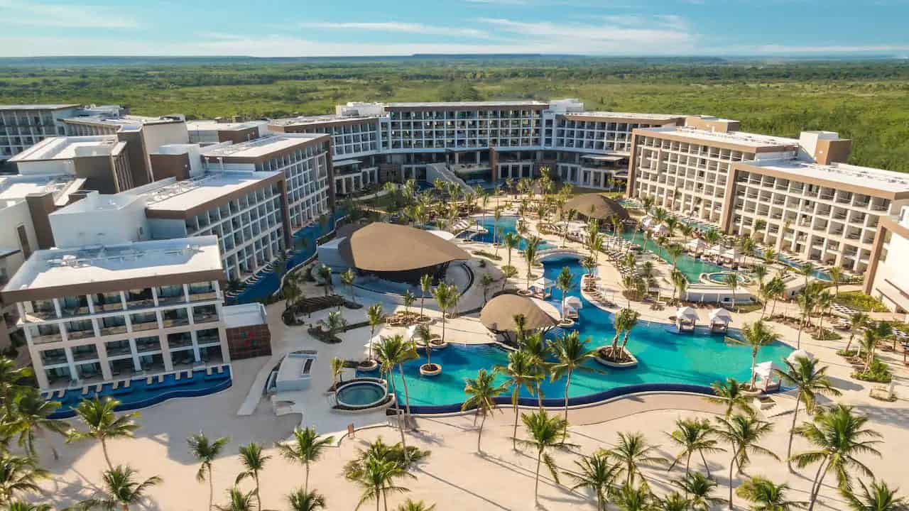 Aerial view of Hyatt Ziva Cap Cana all-inclusive resort with pools, palm trees, and beachfront in the Dominican Republic