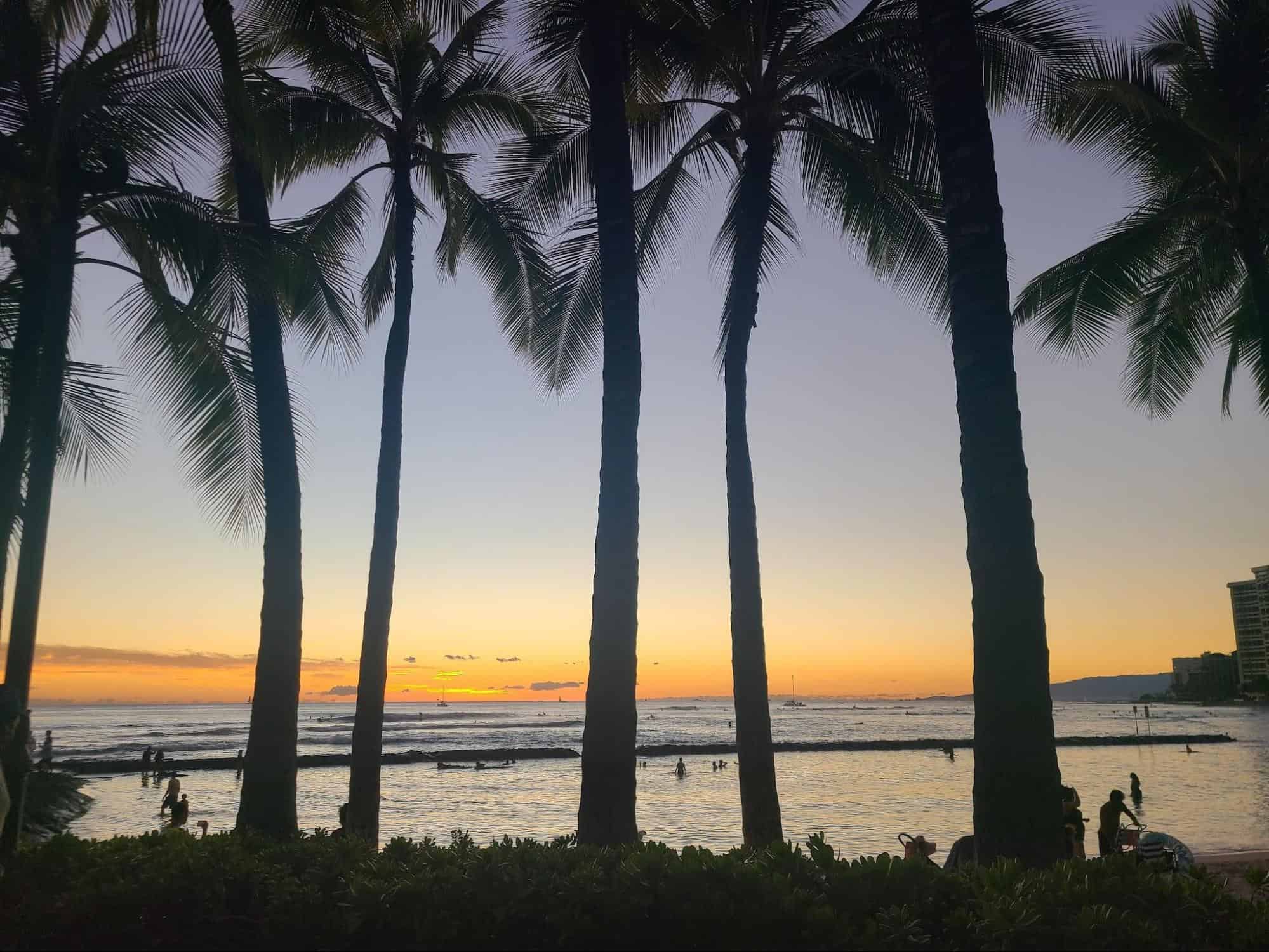 sun sets in Waikiki Beach