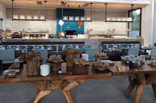 Breakfast buffet at Zemi Beach House with bakery items in foreground