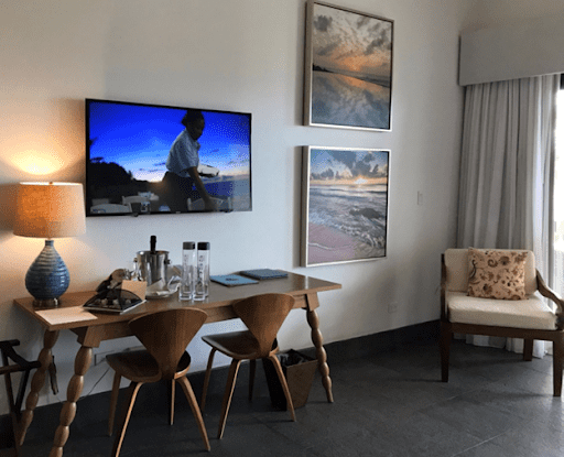 Zemi Beach House room - desk, television and chair