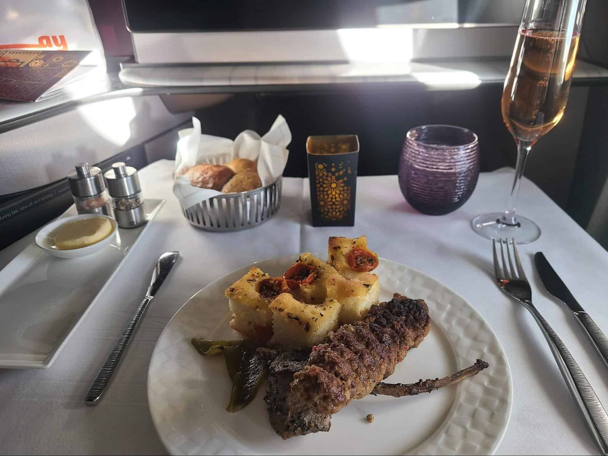 Char-grilled kofta and lamb chop onboard Qatar Qsuites business class