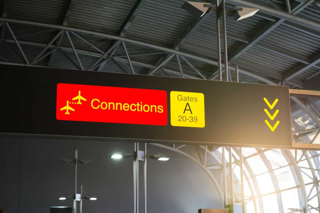 Airport connections sign for transfer flights and stopover gates