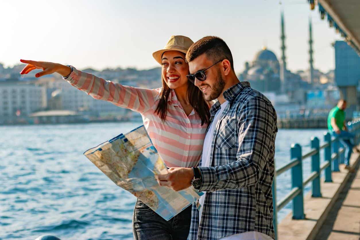 Couple sightseeing along the waterfront in Istanbul.