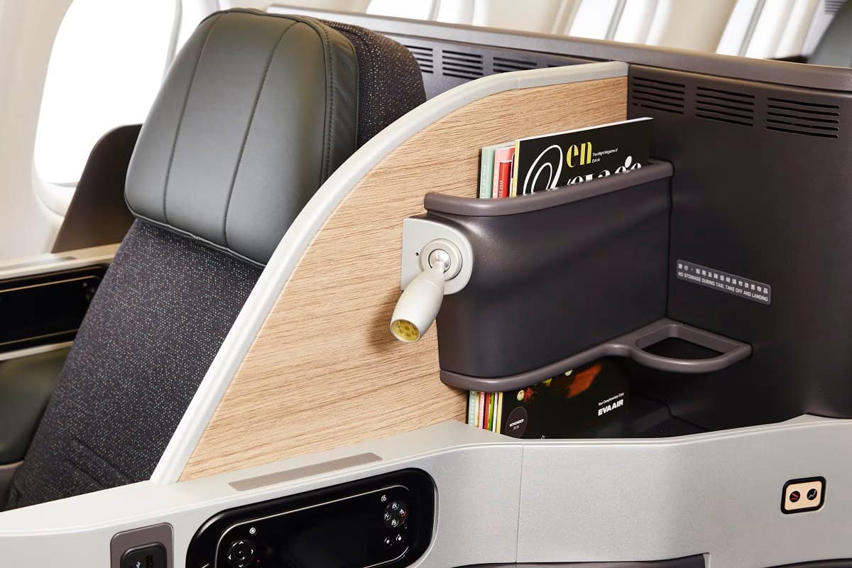 A close-up view of an EVA Air business class seat, bookable with points