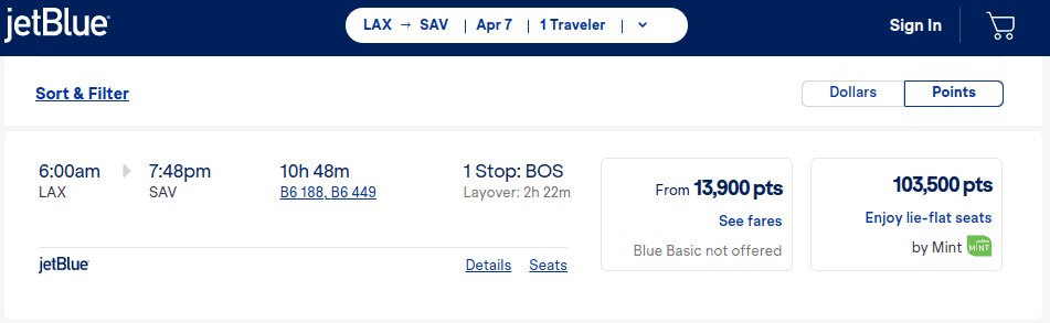 JetBlue flight search results showing a 6:00am flight from LAX to SAV with a stop in BOS, from 13,900 points, and an option to enjoy lie-flat seats with 103,500 points.