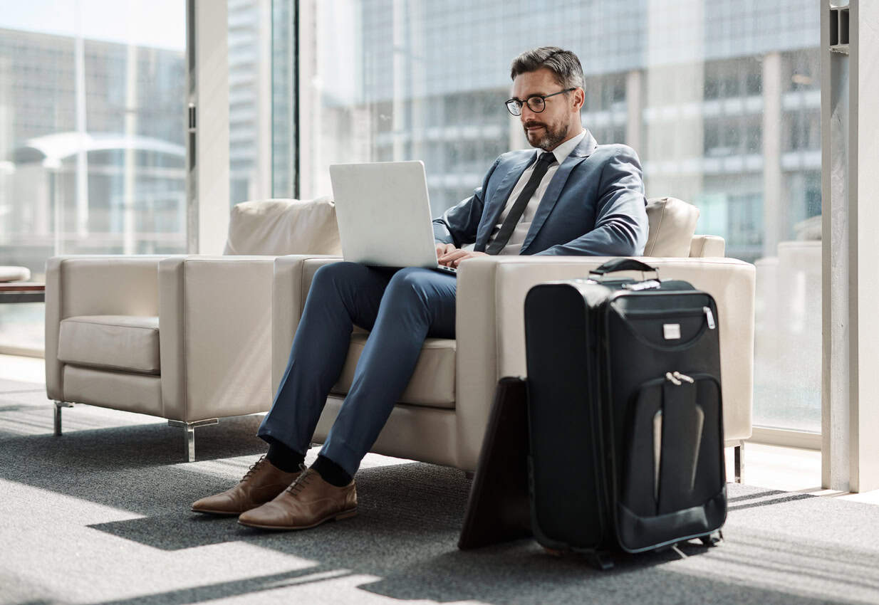 business travel airport laptop