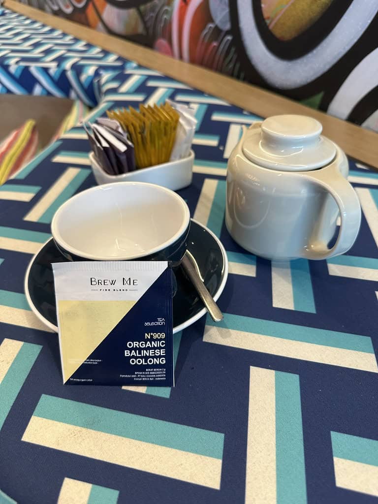 Organic Balinese oolong tea served at Aloft Bali Seminyak with modern patterned table setting