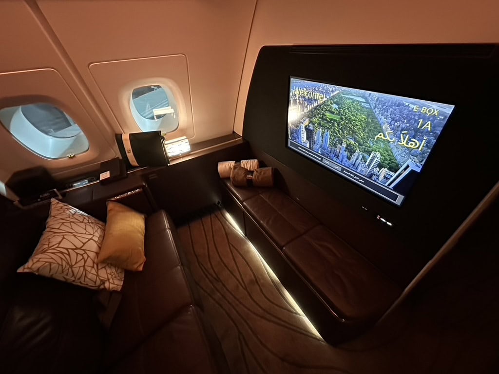 Etihad Airways The Residence entertainment suite with widescreen TV and luxury seating