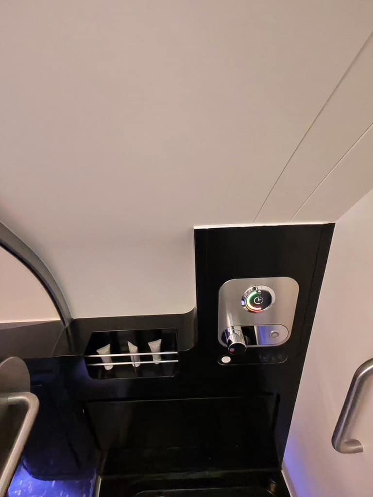 Etihad Airways The Residence shower control panel with modern temperature dial