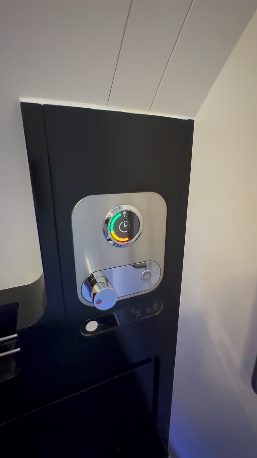 Etihad Airways The Residence shower timer and control panel with LED indicator