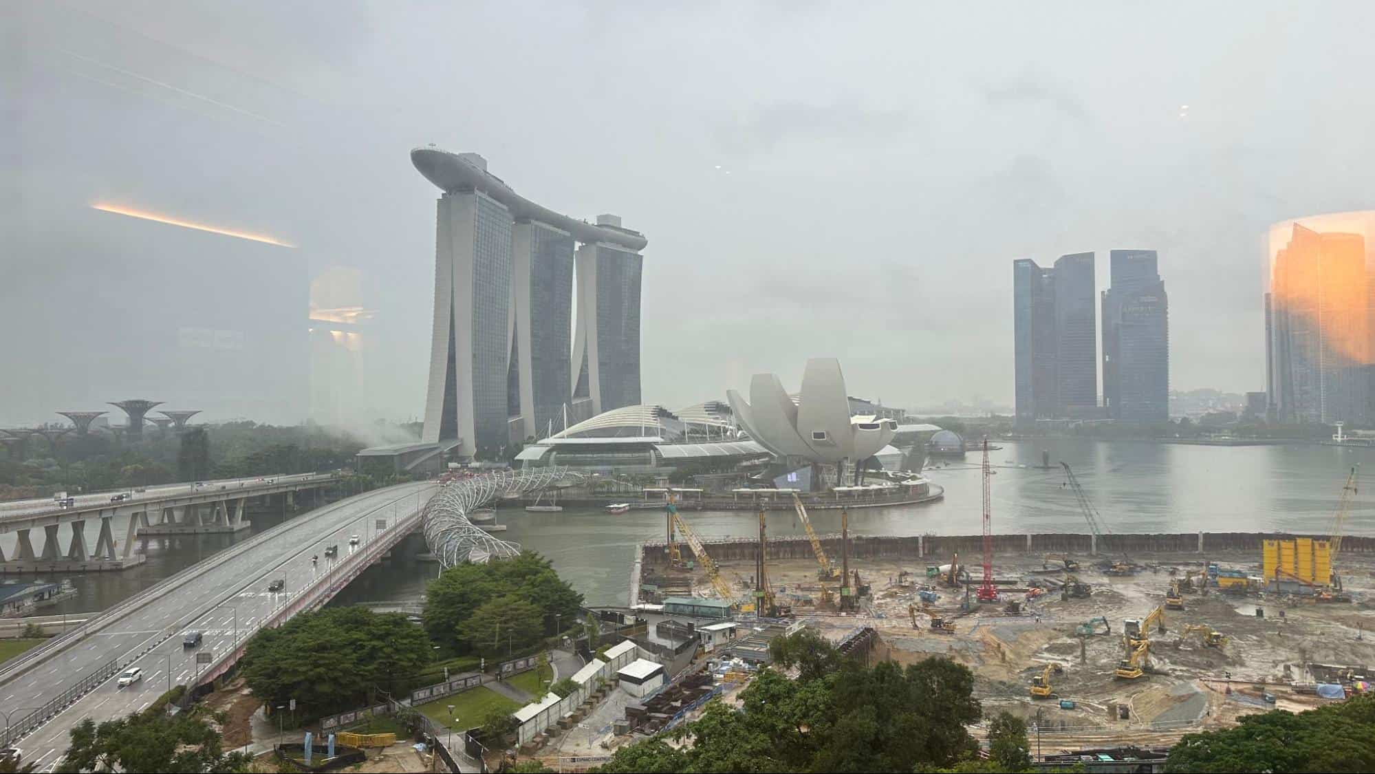 Daytime view of Marina Bay Sands, Helix Bridge, and ArtScience Museum in Singapore