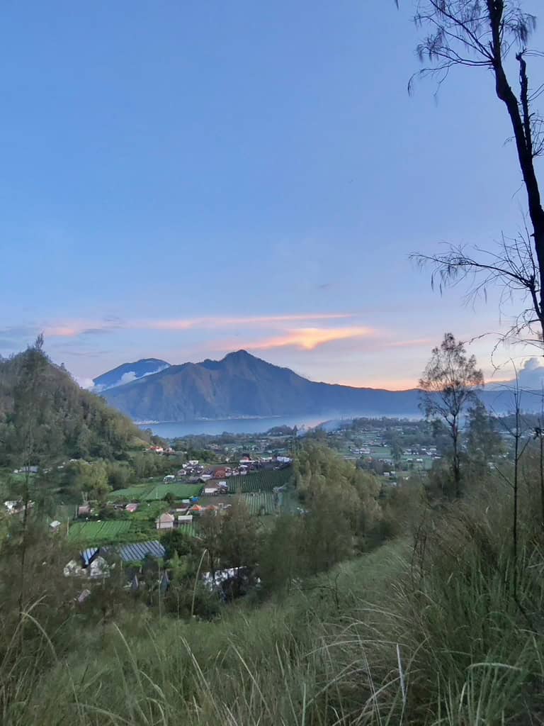 Sunrise view of Mount Batur and surrounding village landscape in Bali