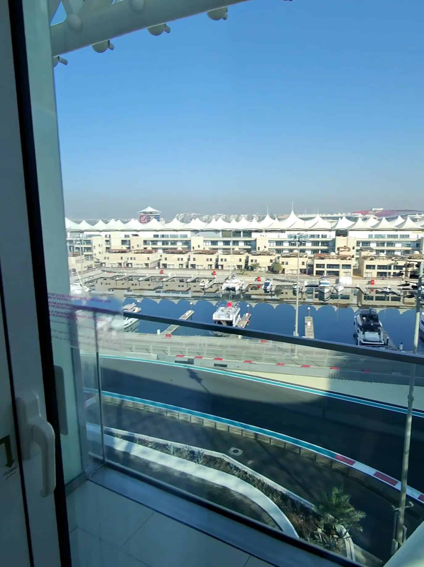 Balcony view overlooking Yas Marina and race track from W Abu Dhabi