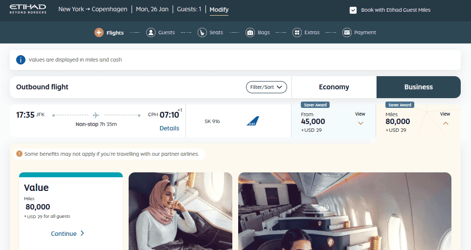 Etihad Guest booking screen showing a business-class saver award from New York JFK to Copenhagen on SAS for 80,000 miles plus $29 in taxes and fees