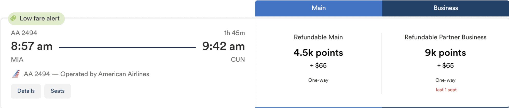 American Airlines business class flight from Miami to Cancun (CUN) using Atmos Rewards.