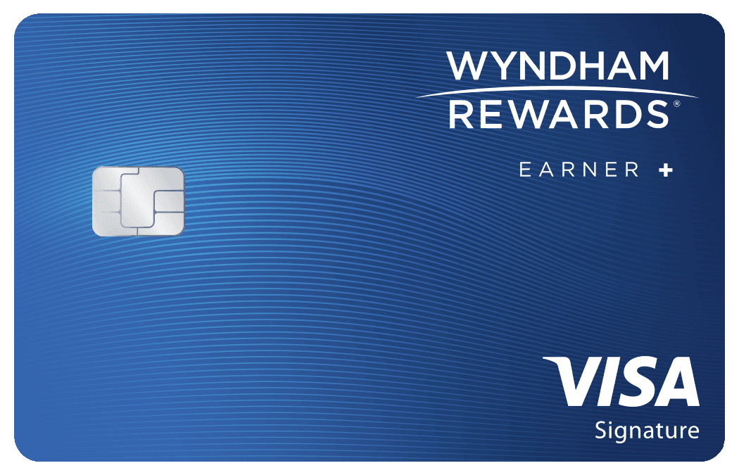 A blue Wyndham Rewards Earner Plus Card with a city skyline illustration, chip, and the words earner+, Wyndham Rewards, member name, and card number shown.
