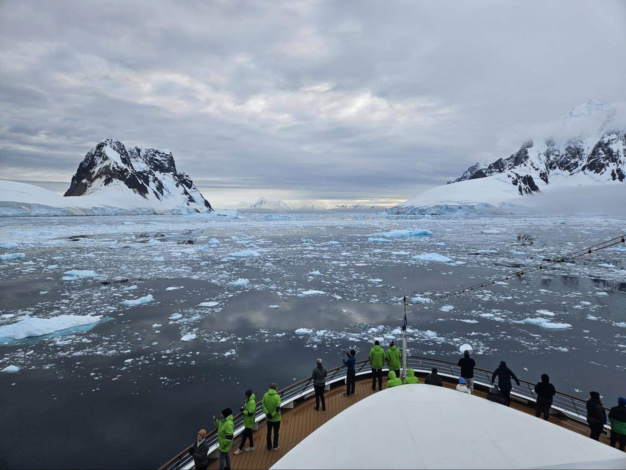 An expedition ship crosses the Lemaire Channel in Antarctica. | Photo by Anya Kartashova